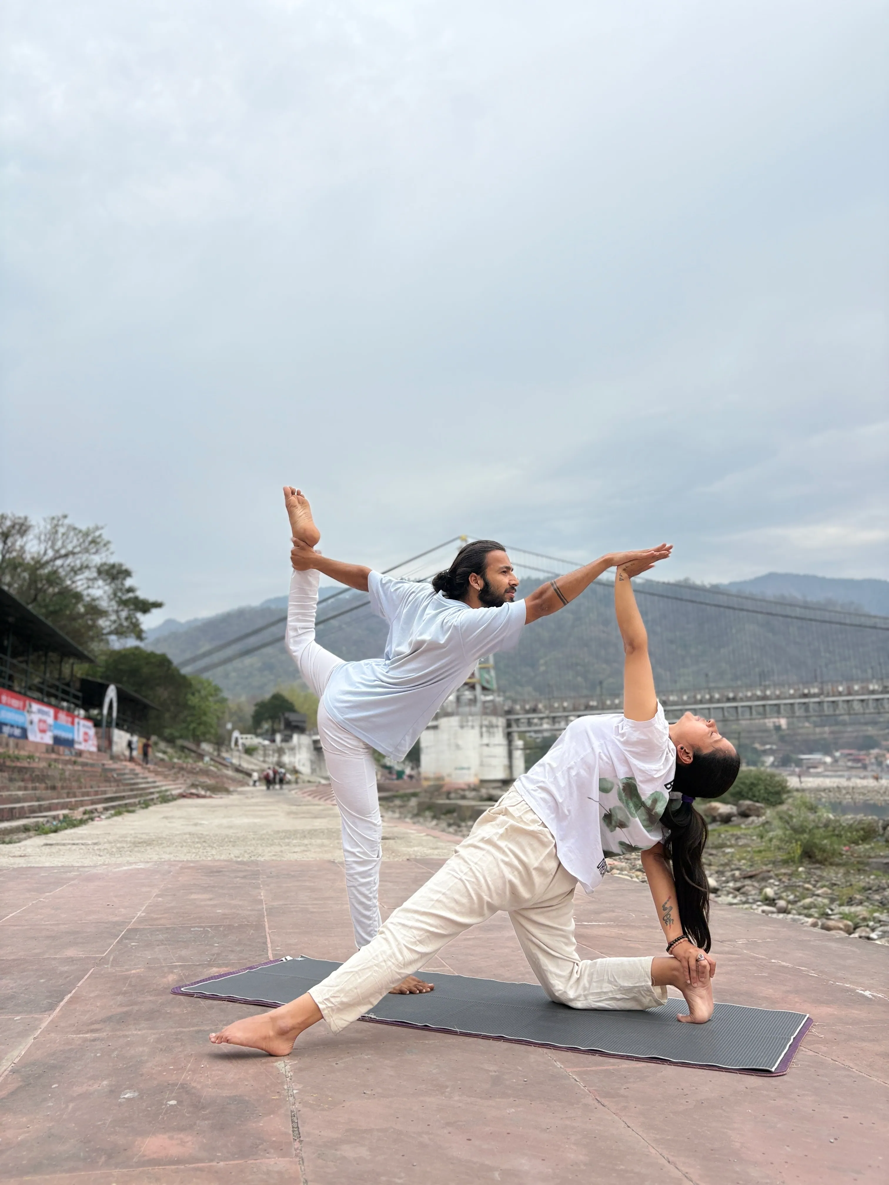 Students practising yoga at IYA