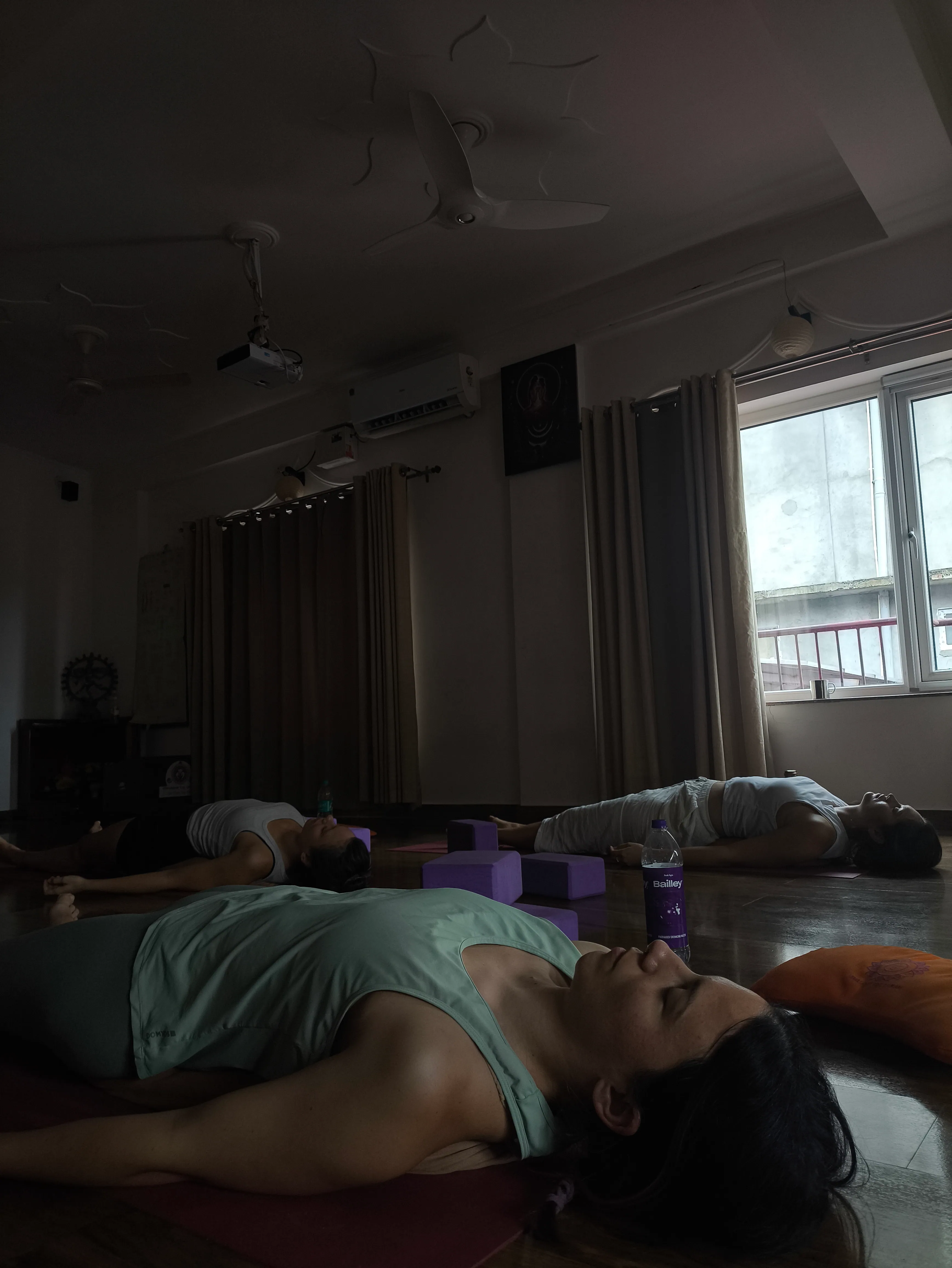 Students practising yoga at IYA Ashram